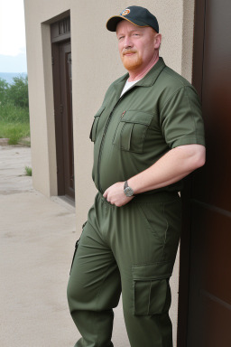 Albanian middle-aged male with  ginger hair