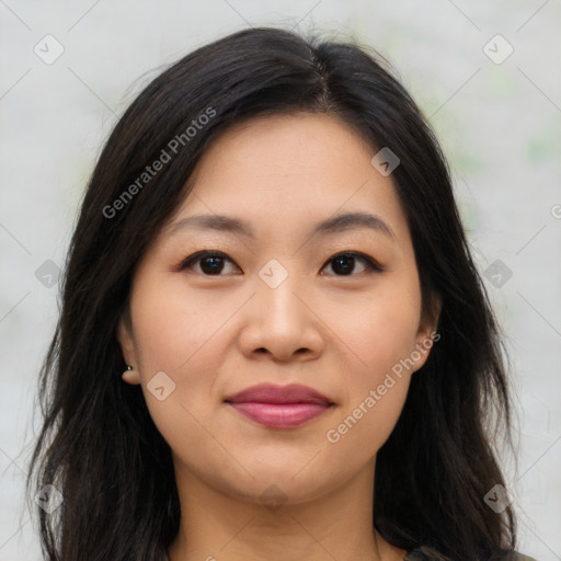 Joyful asian young-adult female with long  brown hair and brown eyes