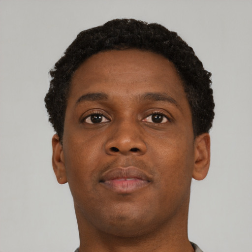 Neutral black young-adult male with short  brown hair and brown eyes