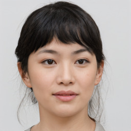 Neutral asian young-adult female with medium  brown hair and brown eyes