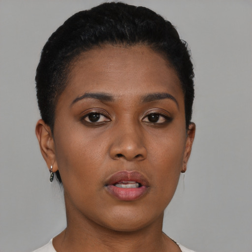 Neutral black young-adult female with short  brown hair and brown eyes