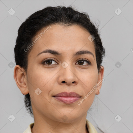 Joyful latino young-adult female with short  brown hair and brown eyes