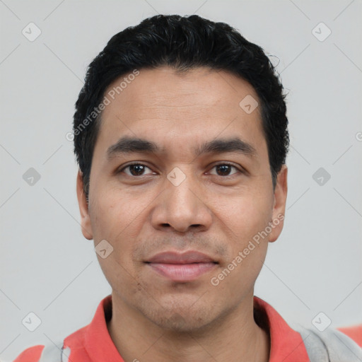 Joyful white young-adult male with short  black hair and brown eyes