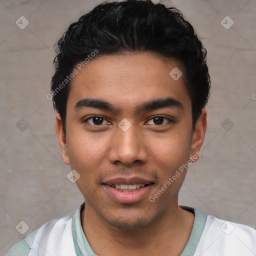 Joyful latino young-adult male with short  black hair and brown eyes