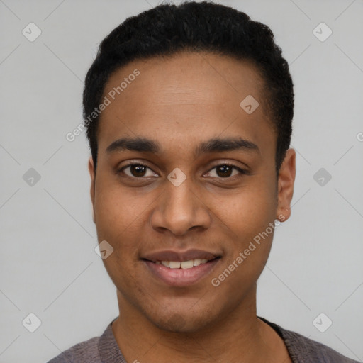 Joyful black young-adult male with short  black hair and brown eyes