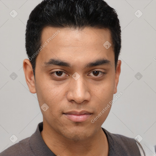 Neutral latino young-adult male with short  black hair and brown eyes