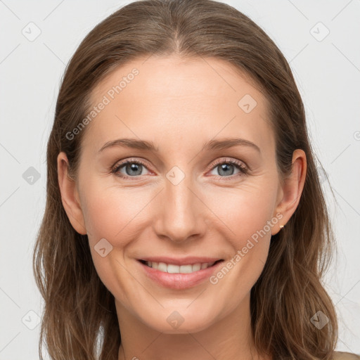 Joyful white young-adult female with long  brown hair and grey eyes