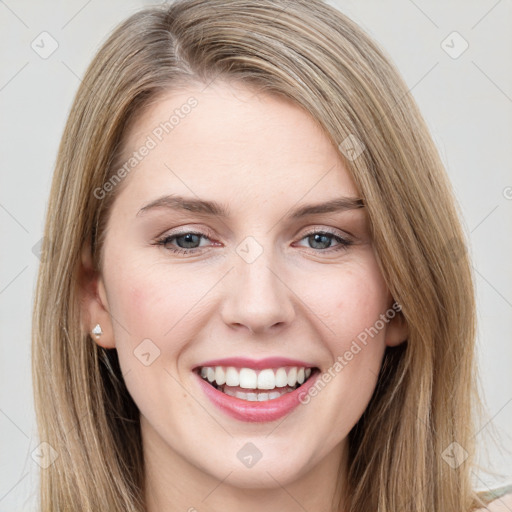 Joyful white young-adult female with long  brown hair and grey eyes