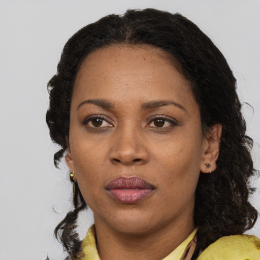 Neutral black adult female with long  black hair and brown eyes
