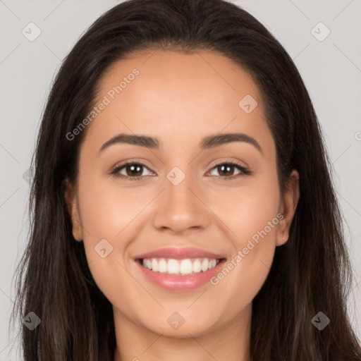 Joyful white young-adult female with long  brown hair and brown eyes