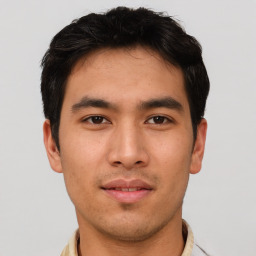 Neutral asian young-adult male with short  brown hair and brown eyes