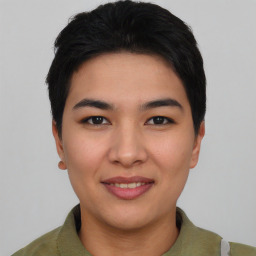 Joyful asian young-adult female with short  black hair and brown eyes