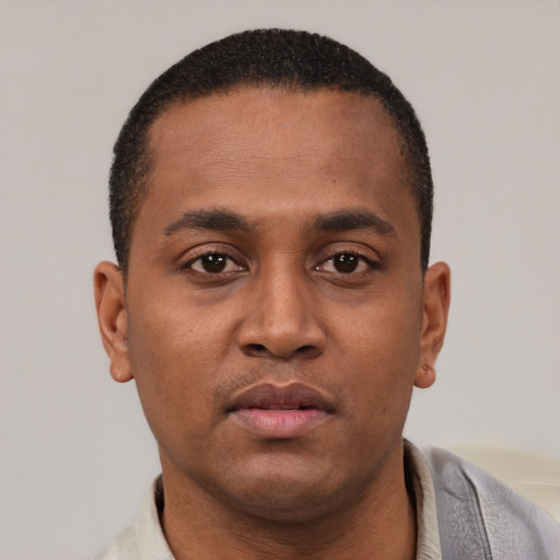 Neutral latino young-adult male with short  brown hair and brown eyes