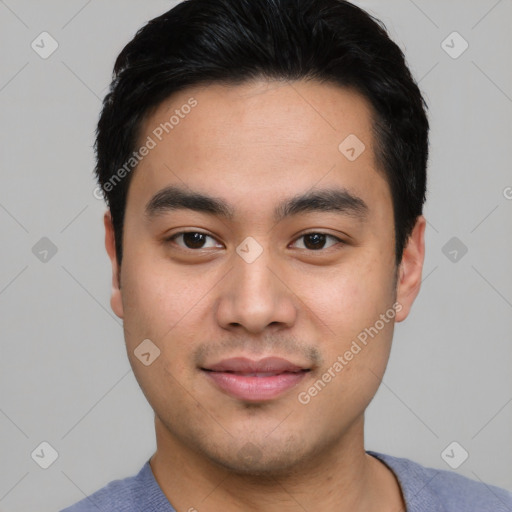 Joyful asian young-adult male with short  black hair and brown eyes