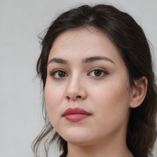 Neutral white young-adult female with medium  brown hair and brown eyes