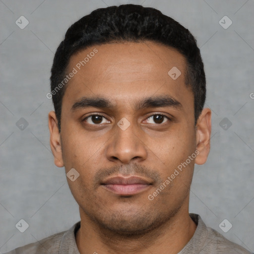 Neutral latino young-adult male with short  black hair and brown eyes