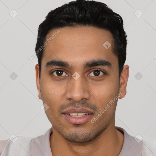 Joyful latino young-adult male with short  black hair and brown eyes