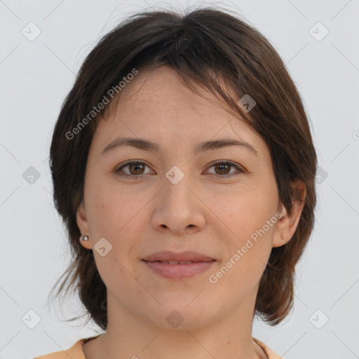 Joyful white young-adult female with medium  brown hair and brown eyes