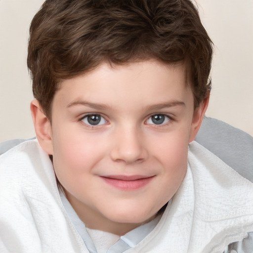 Joyful white child male with short  brown hair and brown eyes