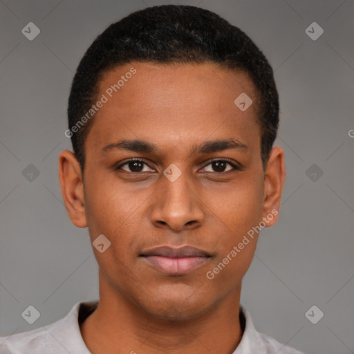 Joyful latino young-adult male with short  brown hair and brown eyes