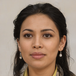 Joyful asian young-adult female with long  brown hair and brown eyes