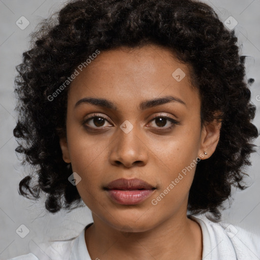 Joyful black young-adult female with medium  black hair and brown eyes