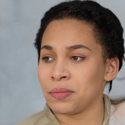 Joyful latino young-adult female with short  brown hair and brown eyes