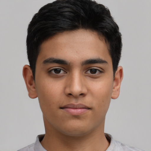 Neutral latino young-adult male with short  black hair and brown eyes