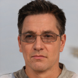 Neutral white middle-aged male with short  brown hair and brown eyes