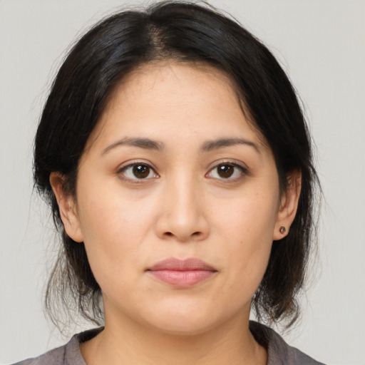 Neutral asian young-adult female with medium  brown hair and brown eyes