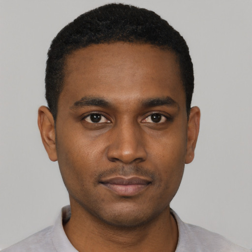 Neutral black young-adult male with short  black hair and brown eyes