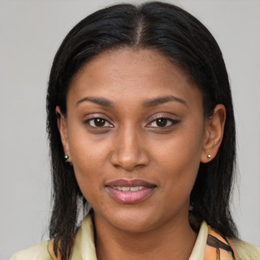 Joyful latino young-adult female with medium  brown hair and brown eyes
