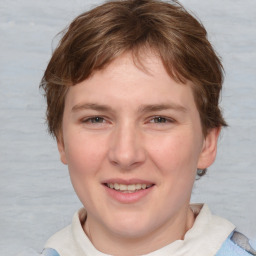 Joyful white young-adult female with medium  brown hair and blue eyes