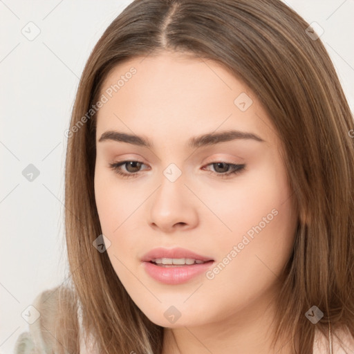 Neutral white young-adult female with long  brown hair and brown eyes