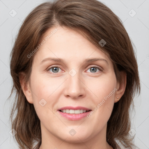 Joyful white young-adult female with medium  brown hair and blue eyes