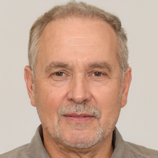 Neutral white middle-aged male with short  gray hair and brown eyes