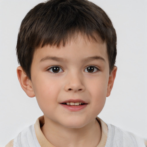 Joyful white child male with short  brown hair and brown eyes