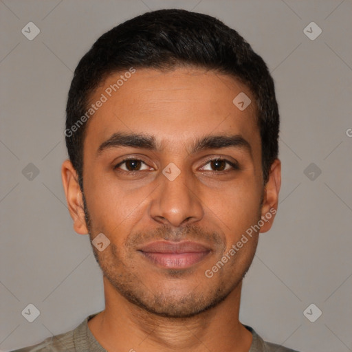 Joyful latino young-adult male with short  black hair and brown eyes