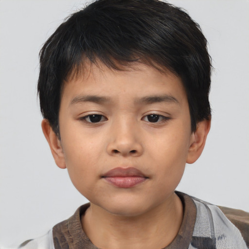 Neutral asian child male with short  brown hair and brown eyes