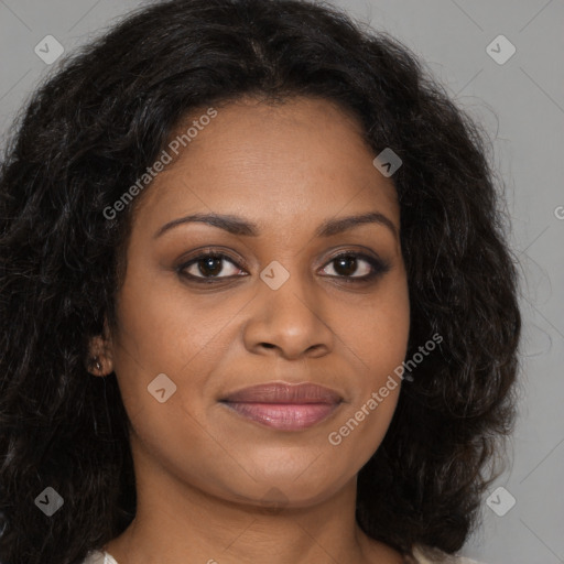 Joyful black young-adult female with long  brown hair and brown eyes