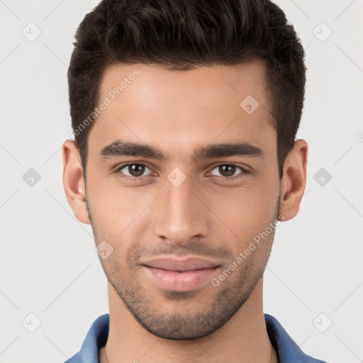 Joyful white young-adult male with short  brown hair and brown eyes