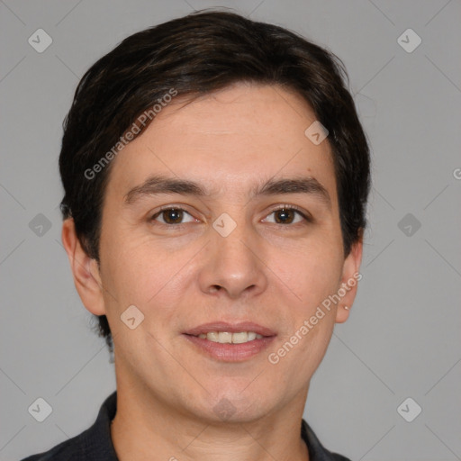 Joyful white adult male with short  brown hair and brown eyes