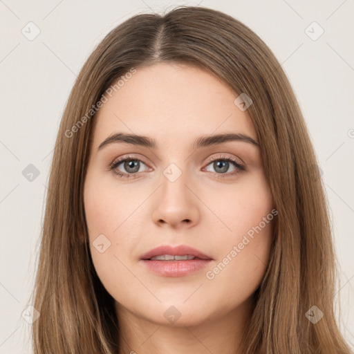 Neutral white young-adult female with long  brown hair and brown eyes