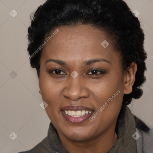 Joyful latino adult female with short  brown hair and brown eyes