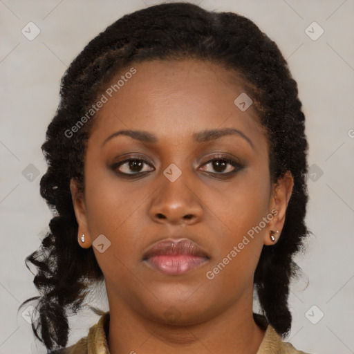 Neutral black young-adult female with long  brown hair and brown eyes