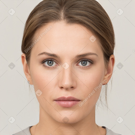 Neutral white young-adult female with medium  brown hair and grey eyes