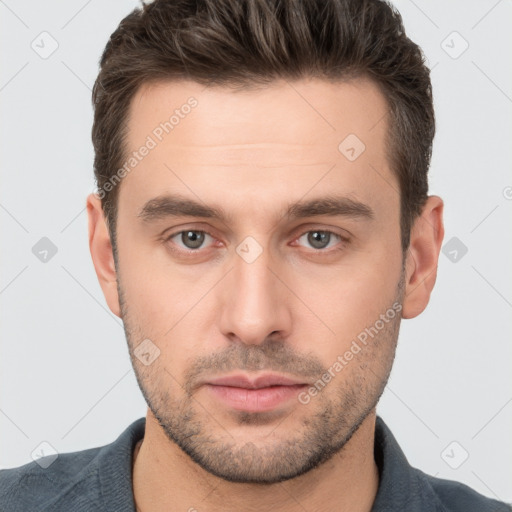 Neutral white young-adult male with short  brown hair and brown eyes