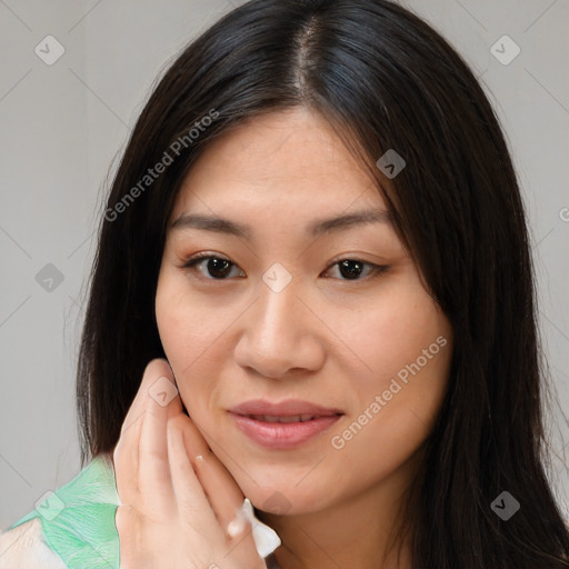 Joyful white young-adult female with long  brown hair and brown eyes