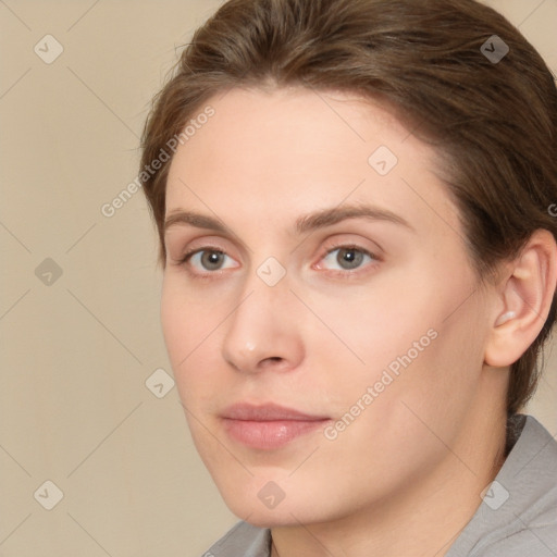 Neutral white young-adult female with short  brown hair and brown eyes