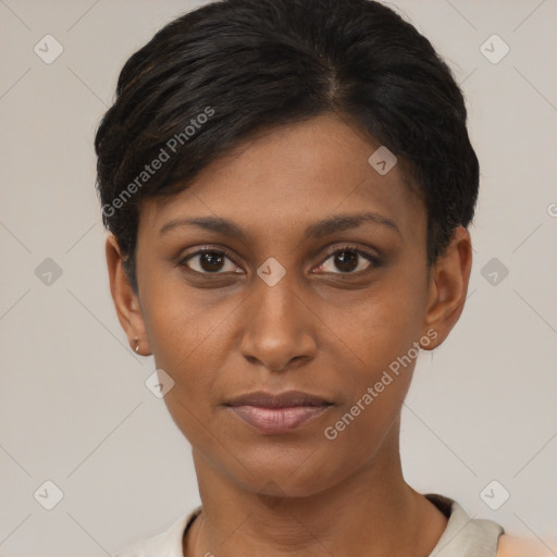 Joyful latino young-adult female with short  brown hair and brown eyes